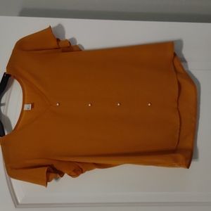 Golden yellow blouse with pearls